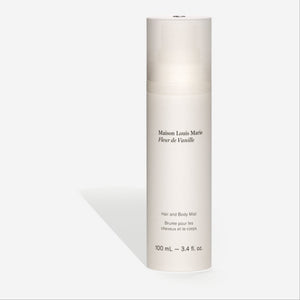 Skincare bottle with white label on a light gray background