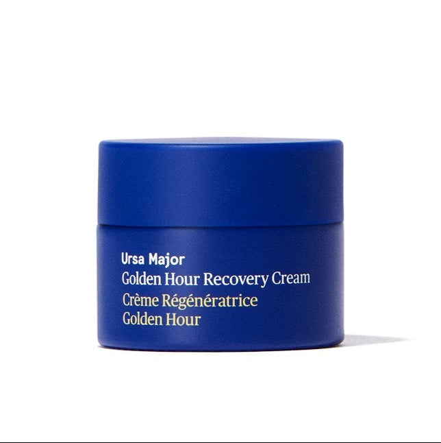 Blue jar of Ursa Major Golden Hour Recovery Cream on a white background