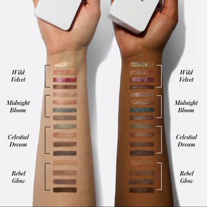 Two hands with makeup swatches labeled 'Wild Velvet', 'Midnight Bloom', 'Celestial Dream', and 'Rebel Glow' on a white background.