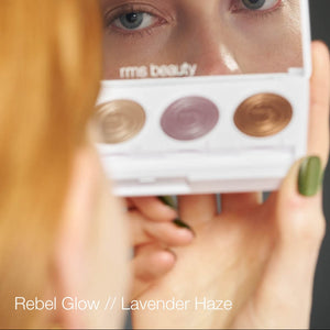 Makeup palette held up to a mirror with 'me beauty' branding.
