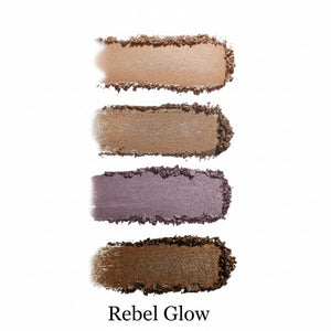 Four swatches of different eyeshadow colors on a white background