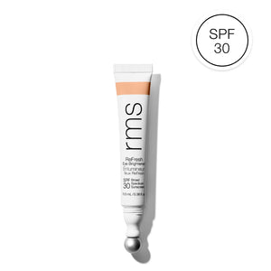RMS Beauty eye brightener tube on a white background with SPF 30 label.