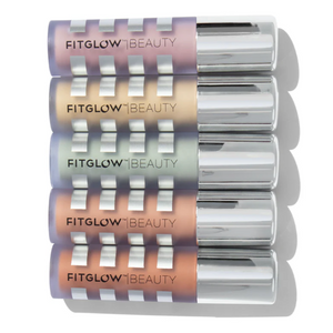 Stack of Fitglow beauty products with reflective packaging on a white background