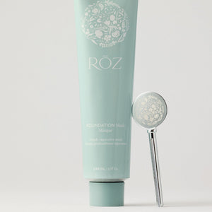 Skincare product with 'ROZ' branding on a light gray background