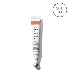 RMS Beauty eye brightener tube with SPF 30 label on a white background