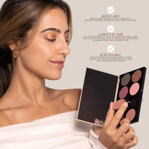 Woman holding a makeup palette with product details on a beige background