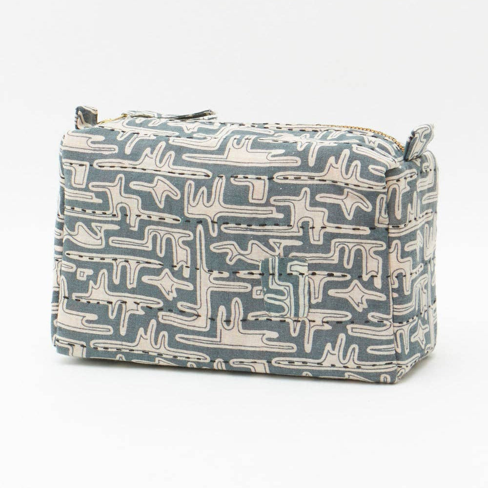 Rectangular fabric basket with geometric pattern on a white background