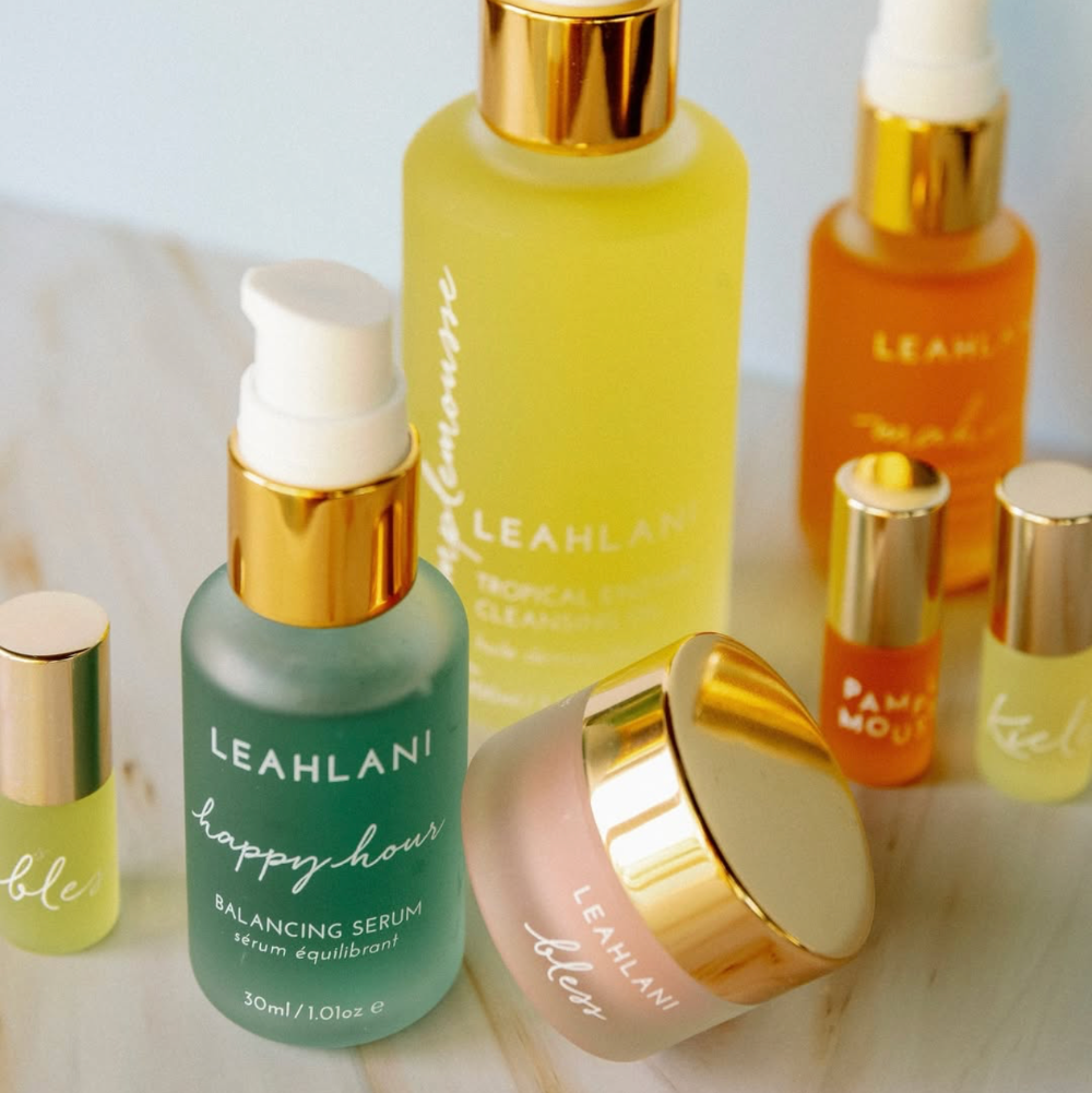 Collection of Leahlani skincare products on a light background