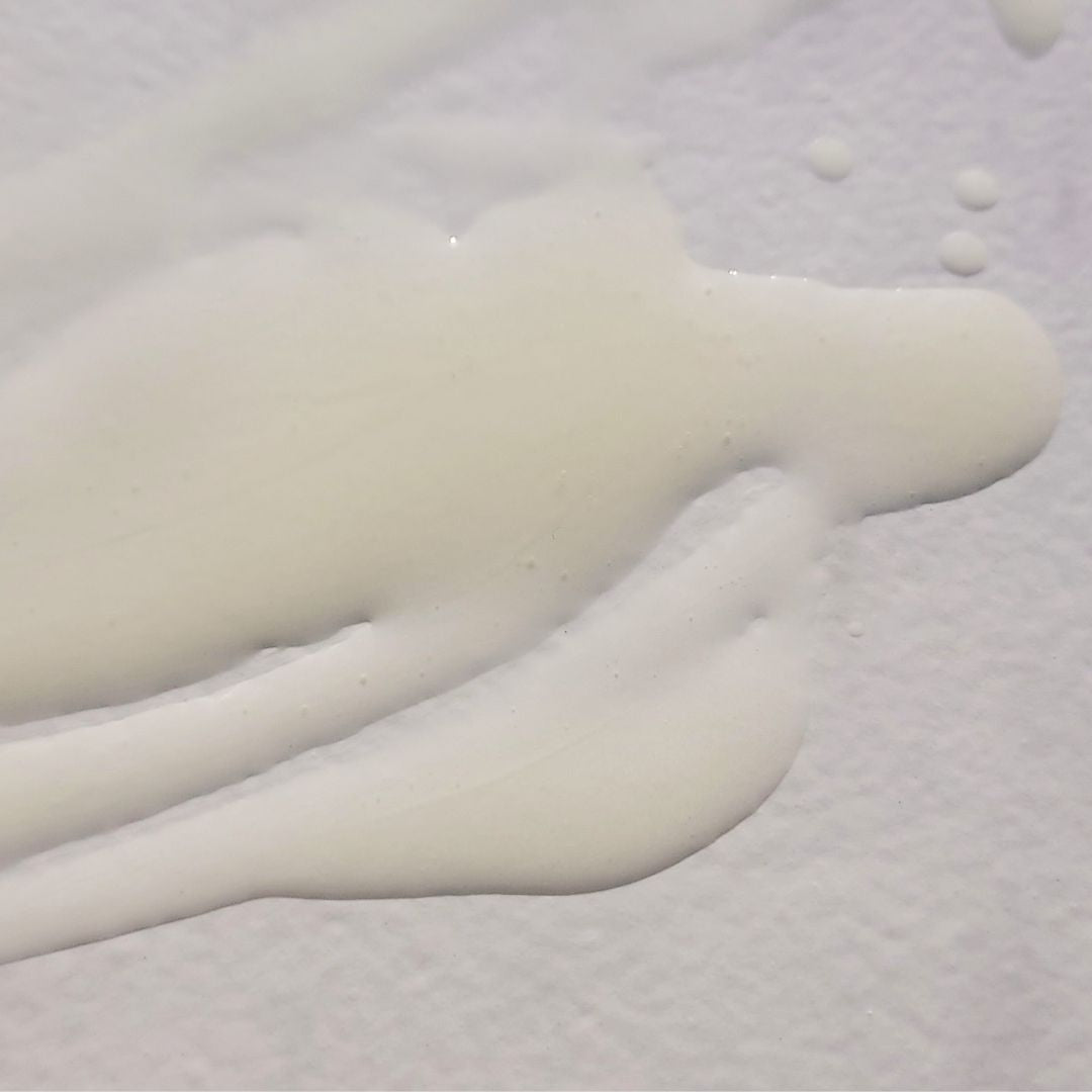 Skincare serum bottle labeled 'Retinol Serum' on a white background