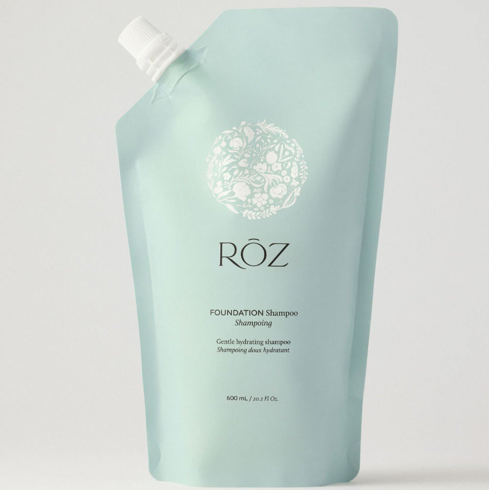 Light blue shampoo bottle with 'Röz' branding on a white background