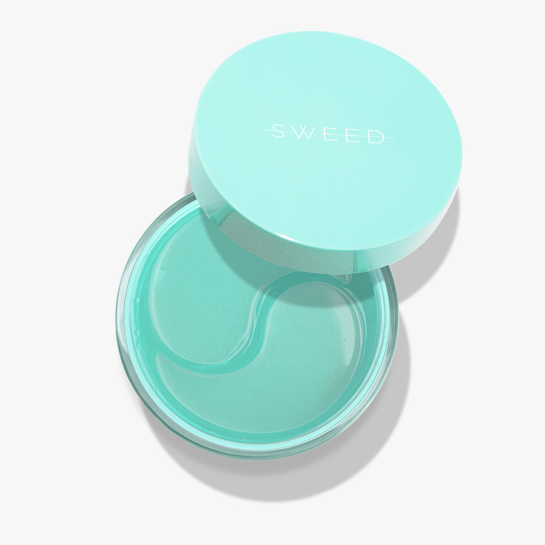Turquoise eye mask in a container with 'SWEET' branding on a white background