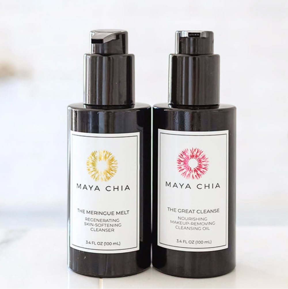 Two bottles of Maya Chia skincare products on a white background