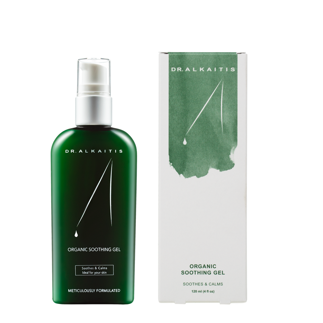 A pump bottle of Dr. Alkaitis Organic Soothing Gel next to its packaging box.